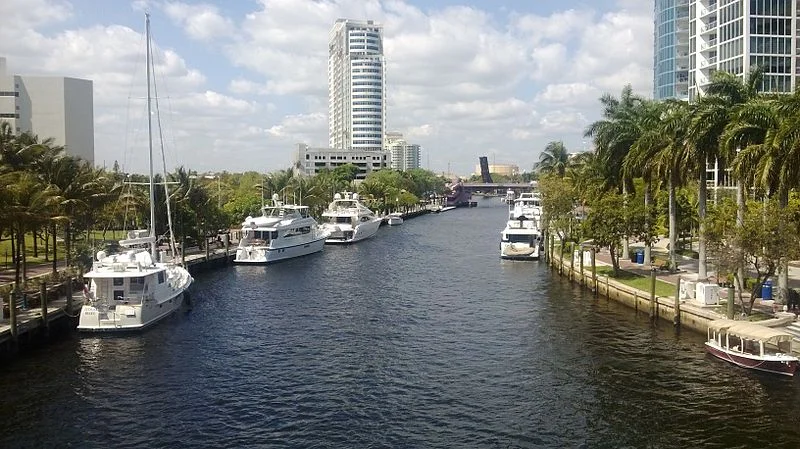 South Florida Intracoastal Waterway lined with yachts and palm trees